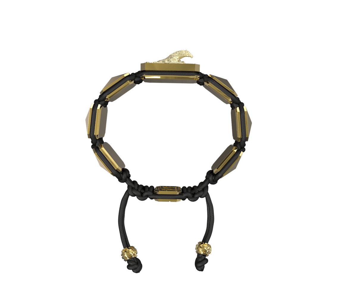 I'm Different bracelet with ceramic and sculpture finished in 18k Yellow Gold complemented with a black coloured cord.