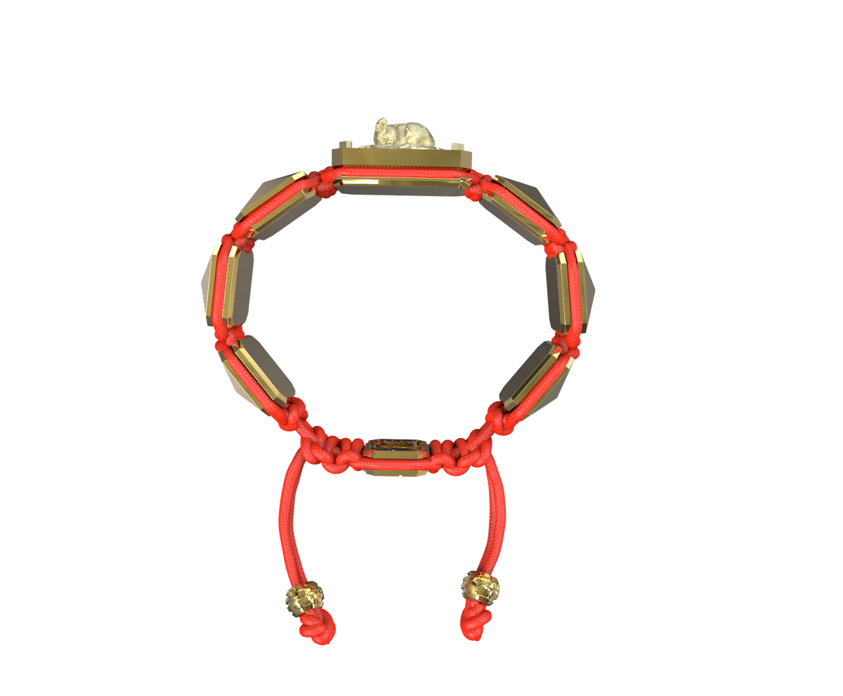 I Love My Baby bracelet with ceramic and sculpture finished in 18k Yellow Gold complemented with a red coloured cord.