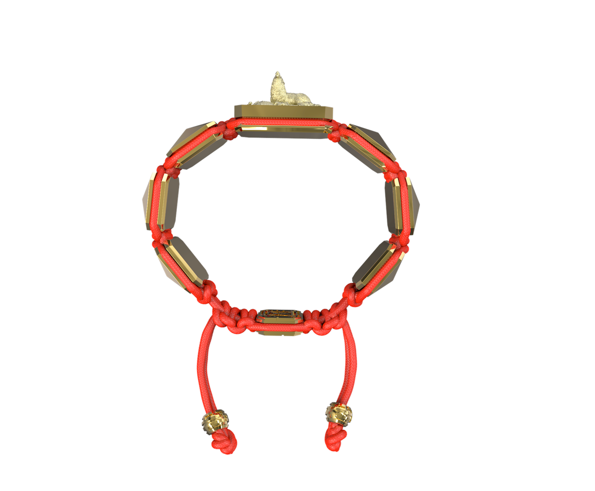 Selfmade bracelet with ceramic and sculpture finished in 18k Yellow Gold complemented with a red coloured cord.