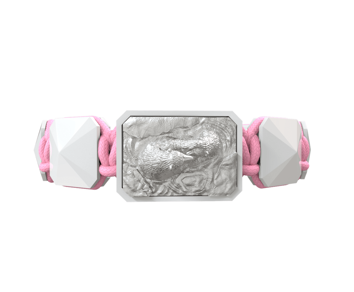 Proud Of You bracelet with white ceramic and sculpture finished in a Platinum effect complemented with a pink coloured cord.