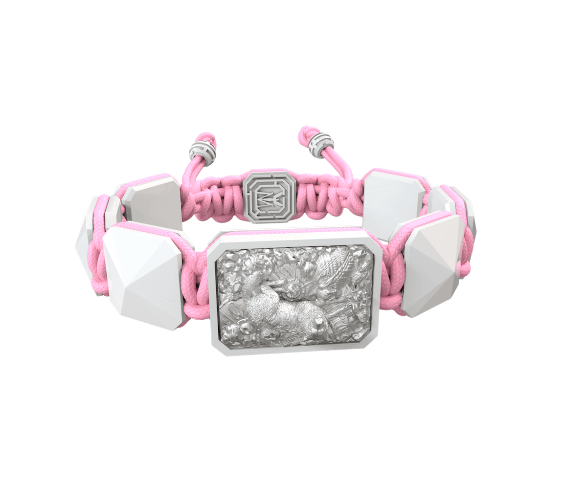 Selfmade bracelet with white ceramic and sculpture finished in a Platinum effect complemented with a pink coloured cord.