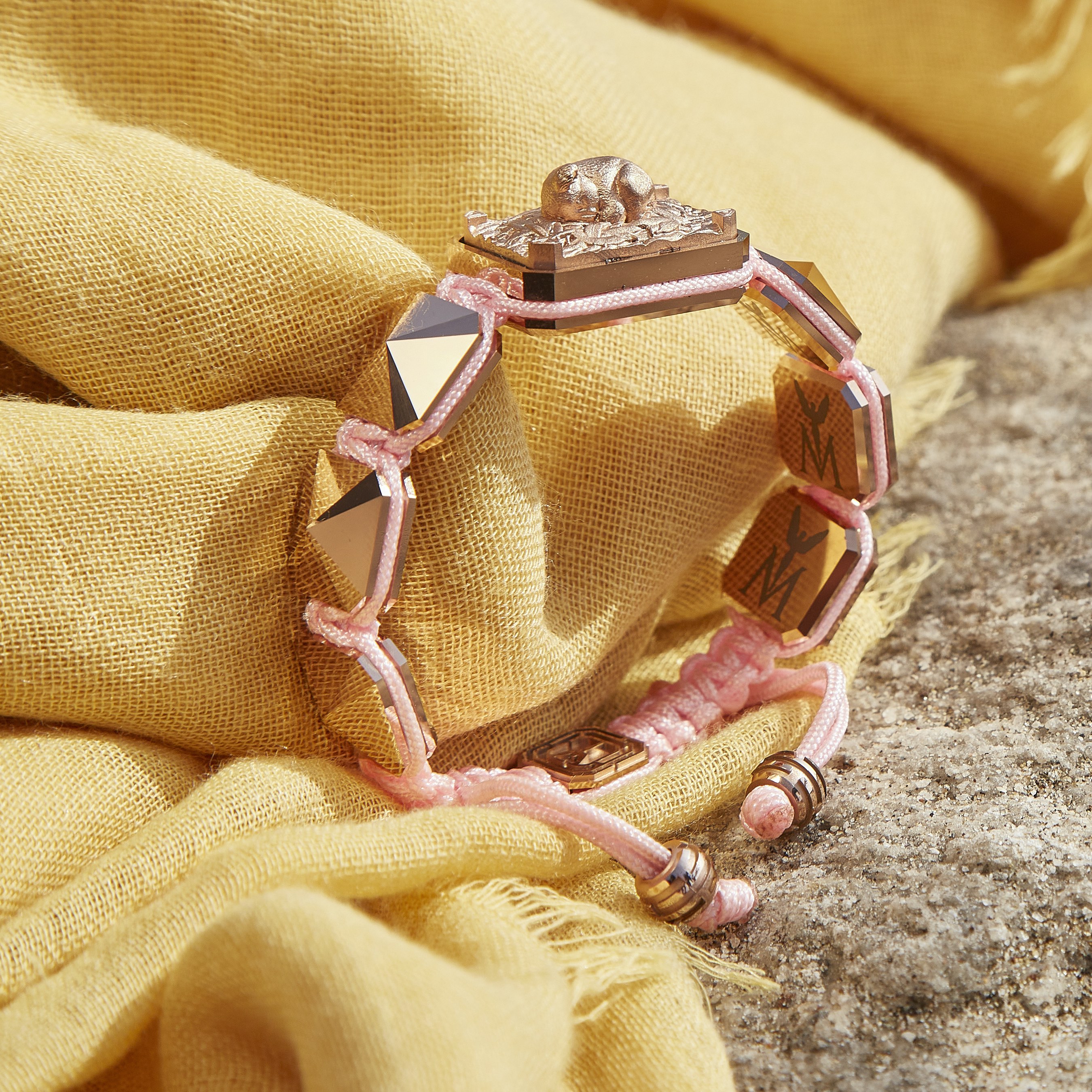 I Love My Baby bracelet with ceramic and sculpture finished in 18k Rose Gold complemented with a pink coloured cord.