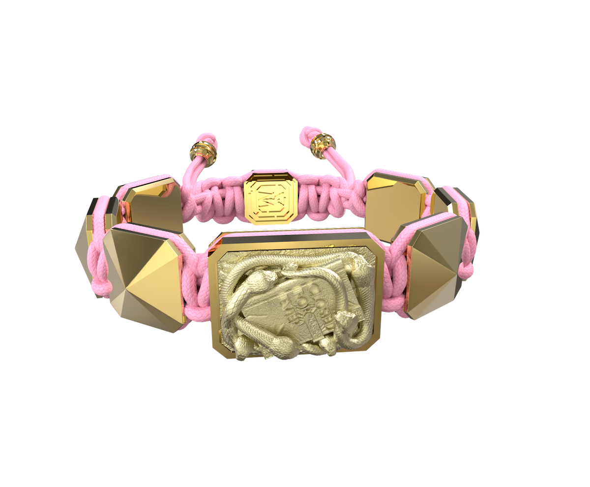 I Quit bracelet with ceramic and sculpture finished in 18k Yellow Gold complemented with a pink coloured cord.