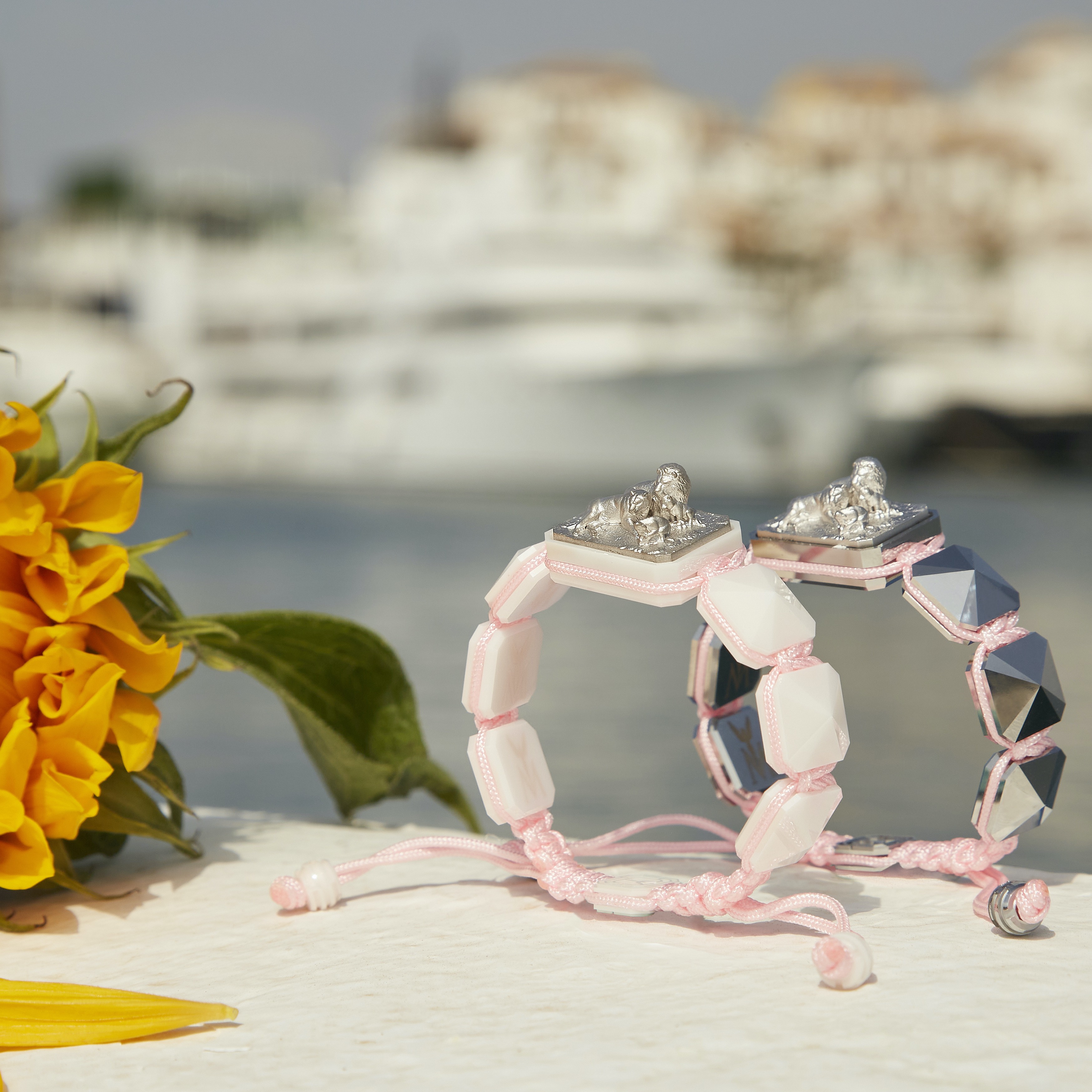 Proud Of You bracelet with ceramic and sculpture finished in a Platinum effect complemented with a pink coloured cord.