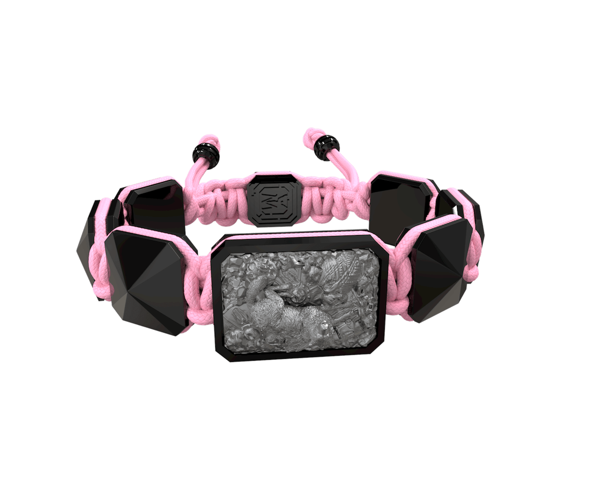 Selfmade bracelet with black ceramic and sculpture finished in anthracite color complemented with a pink coloured cord.