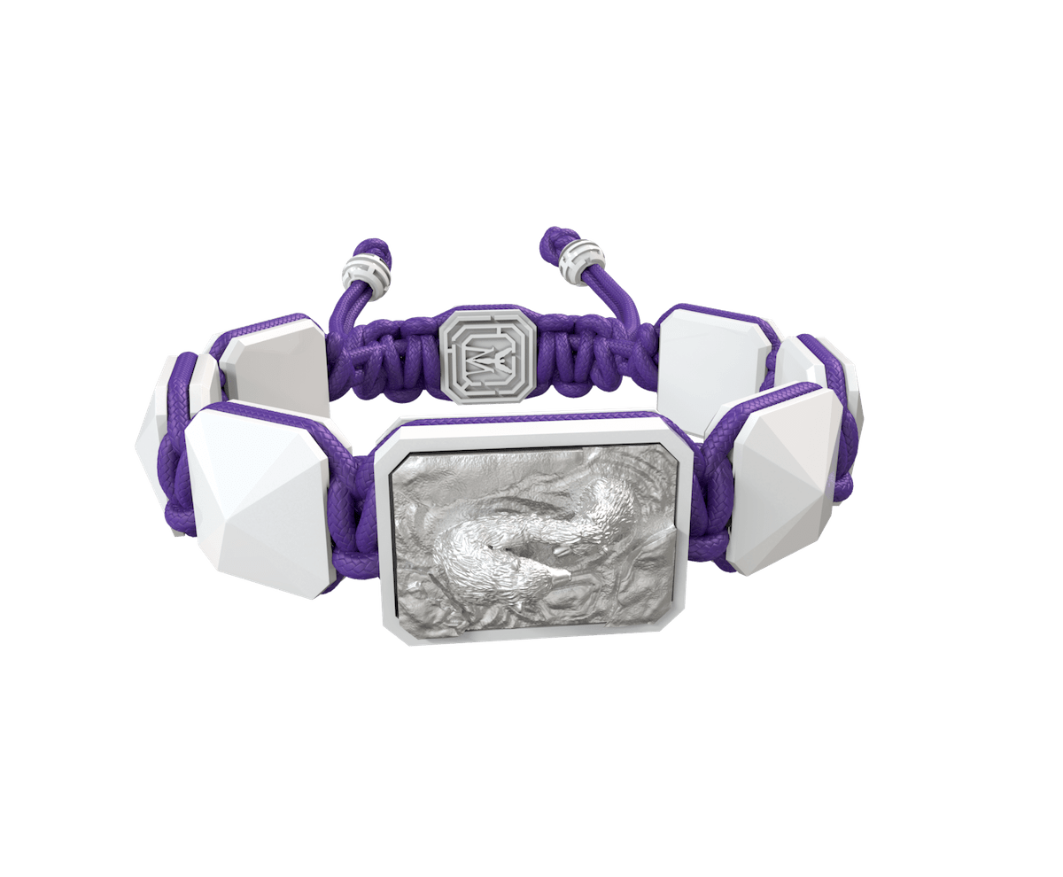 Proud Of You bracelet with white ceramic and sculpture finished in a Platinum effect complemented with a violet coloured cord.
