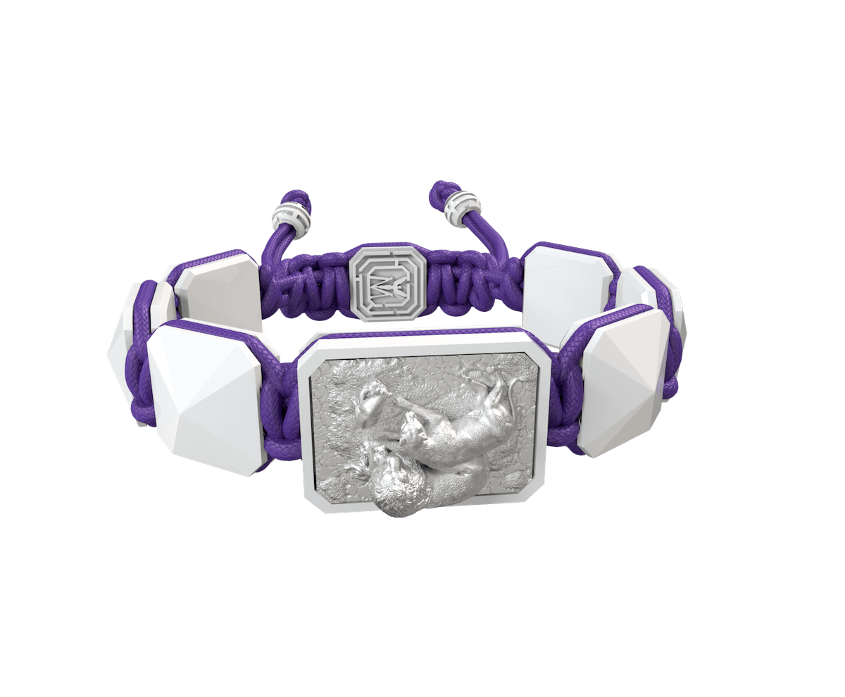 My Family First bracelet with white ceramic and sculpture finished in a Platinum effect complemented with a violet coloured cord.
