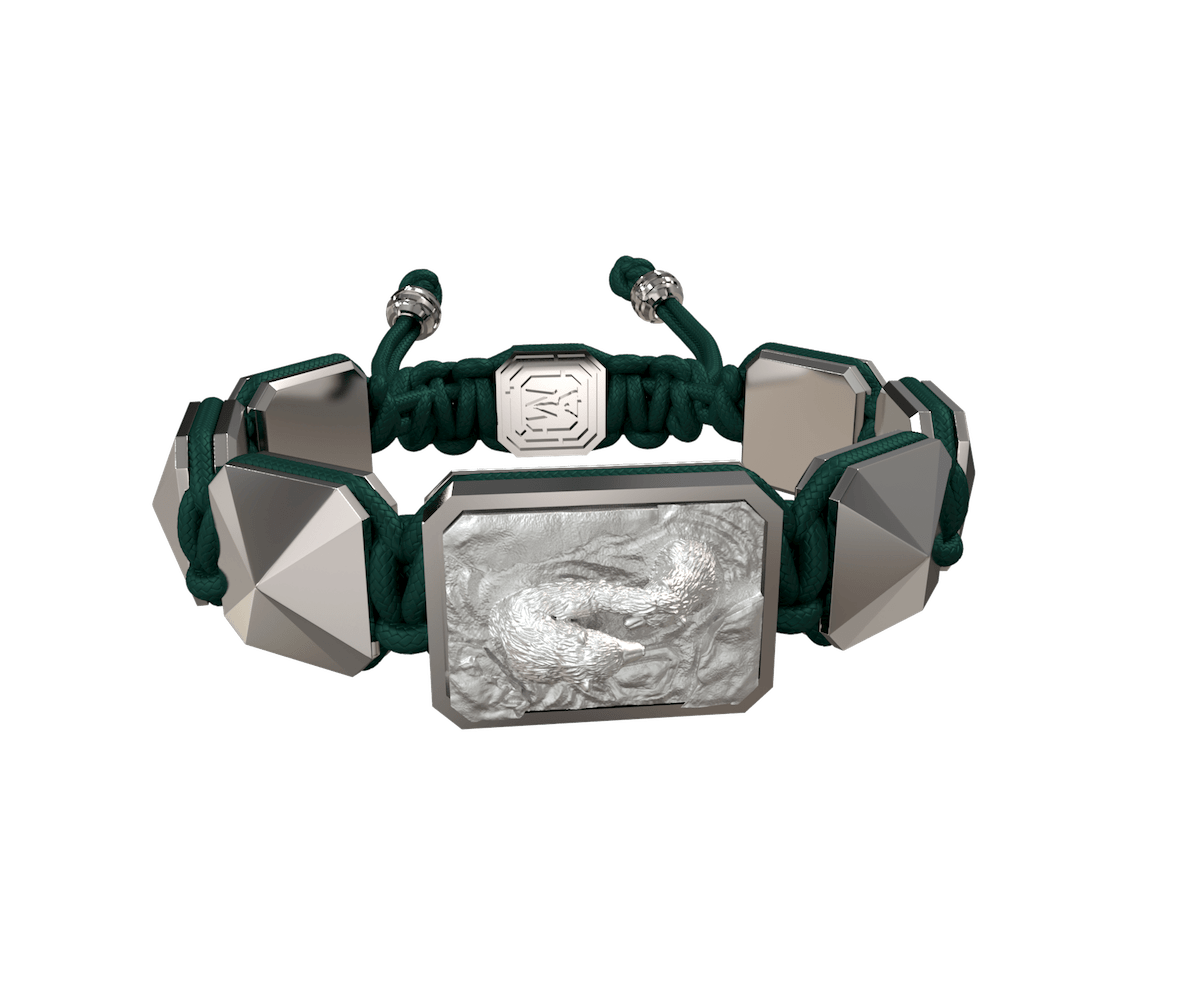 Proud Of You bracelet with ceramic and sculpture finished in a Platinum effect complemented with a dark green coloured cord.