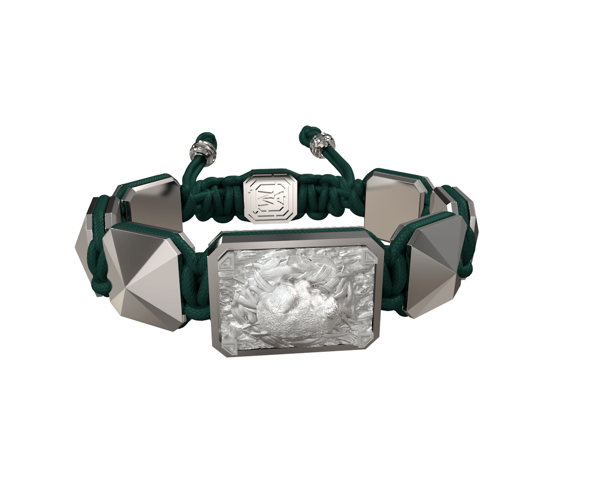 I Love My Baby bracelet with ceramic and sculpture finished in a Platinum effect complemented with a dark green coloured cord.