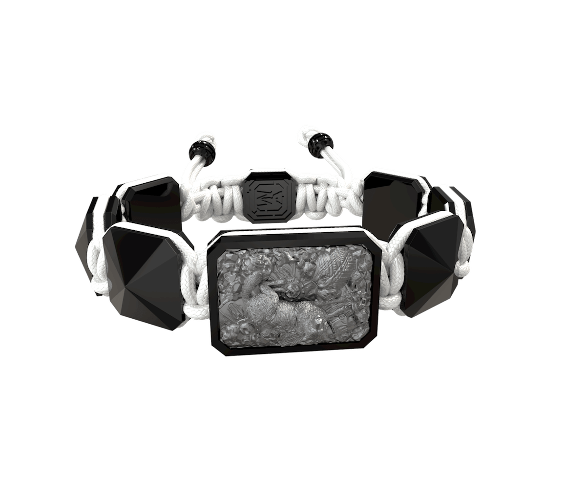 Selfmade bracelet with black ceramic and sculpture finished in anthracite color complemented with a white coloured cord.