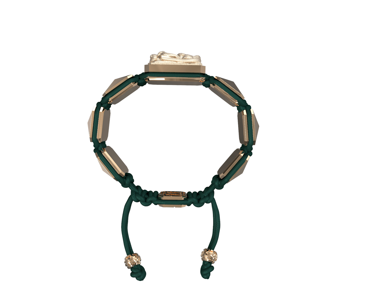 I Quit bracelet with ceramic and sculpture finished in 18k Rose Gold complemented with a dark green coloured cord.