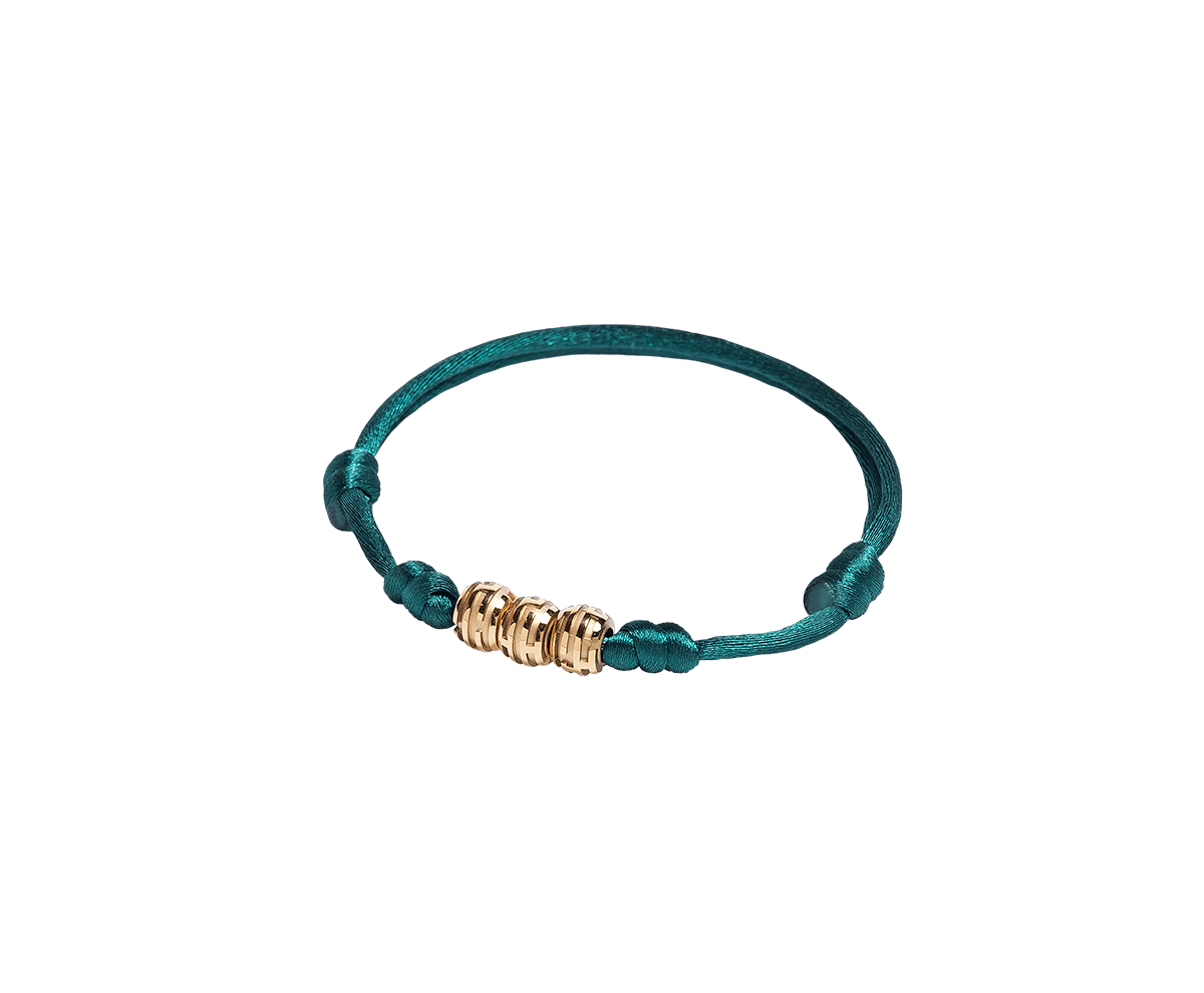 Maze Earth Bracelet finished in Yellow Gold. Carved in ceramics. Green thread.