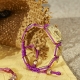 Pulsera I Love My Baby con cerámica y escultura acabadas en Oro Amarillo de 18k. Hilo violeta.