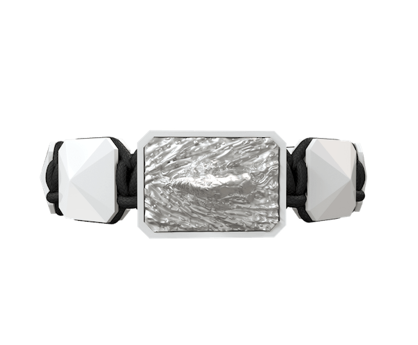 Shop I´m Different bracelet with white ceramic and sculpture finished in a Platinum effect complemented with a black coloured cord.