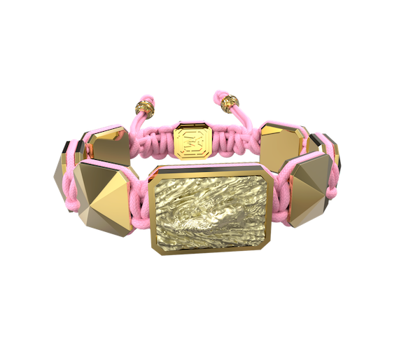 Shop I'm Different bracelet with ceramic and sculpture finished in 18k Yellow Gold complemented with a pink coloured cord.
